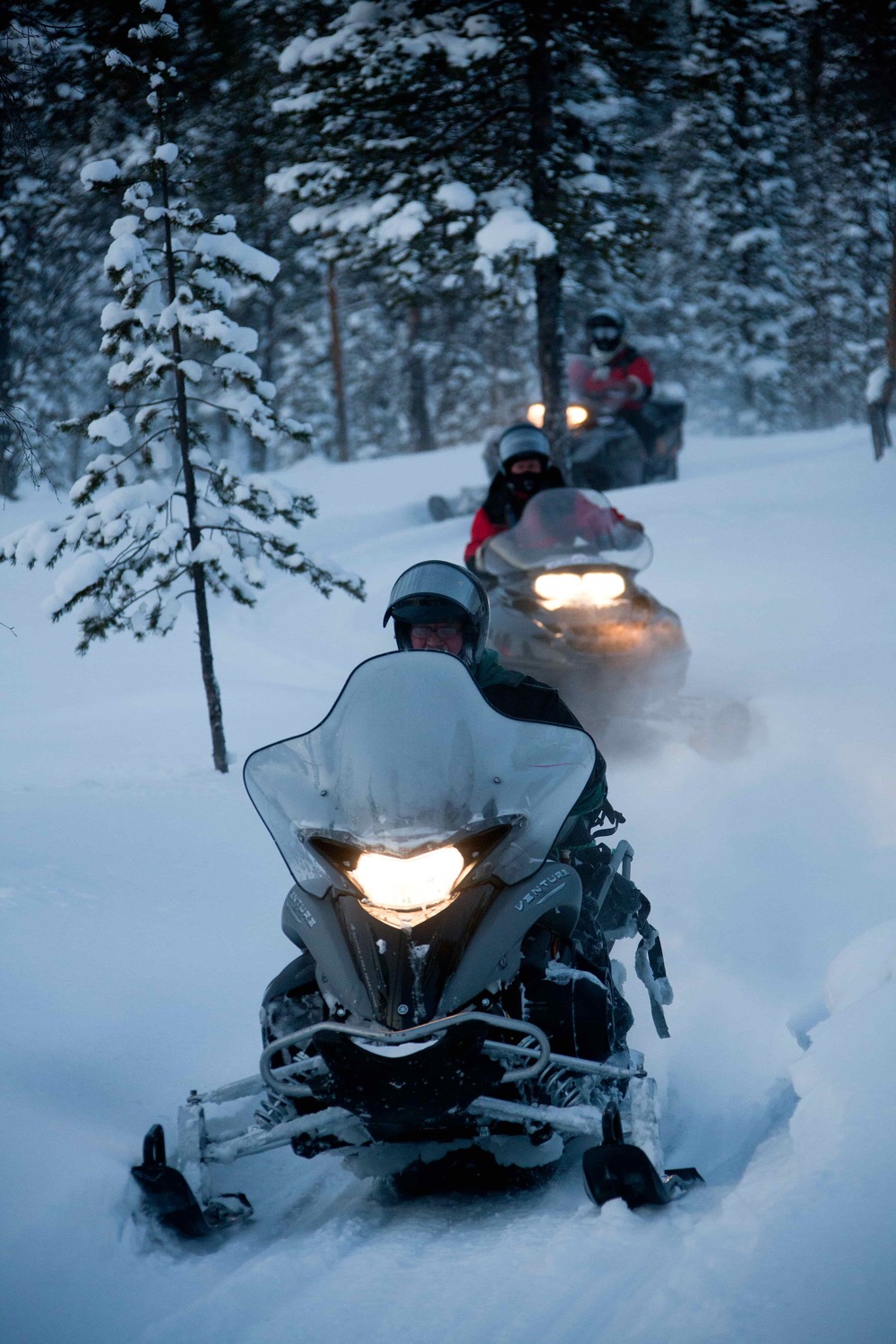 Snowmobile incentive activity in a winter forest